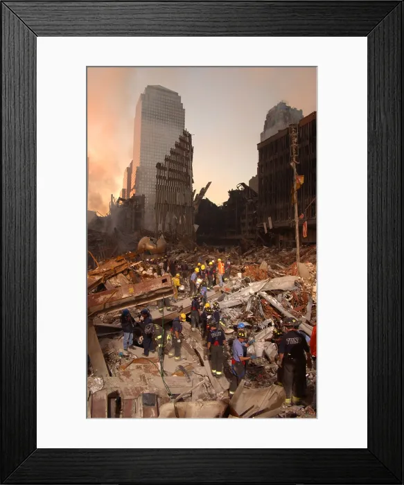 Framed Print : Firefighters and search and rescue teams work on The Pile of rubble from the collapsed World Trade Center
