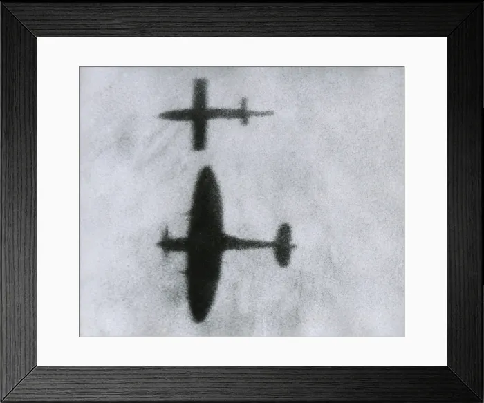 Framed Print : British Spitfire flies beside a V-1, attempting to destabilize and crash the German Buzz Bomb. World War 2, Sept. 22, 1945. (BSLOC_2014_6_40)