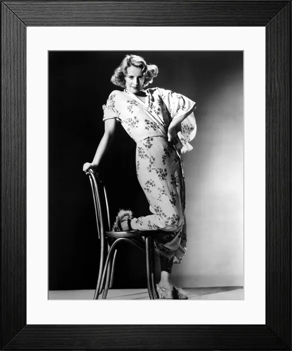 Framed Print : STELLA DALLAS, Barbara Stanwyck (in a dressing gown by Omar Kiam), 1937