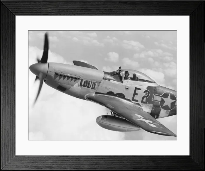 Framed Print : P-51 Mustang fighter plane in flight. It was a World War 2 era long-range, single-seat fighter. Ca. 1942-45. (BSLOC_2014_6_49) Framed Print : P-51 Mustang fighter plane in flight. It was a World War 2 era long-range, single-seat fighter. Ca. 1942-45. (BSLOC_2014_6_49)