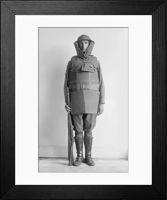 Framed Print : American soldier modeling World War 1 body armor, 1917-1918 (BSLOC_2016_13_153.jpg )