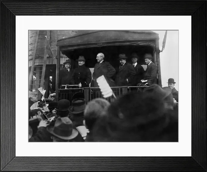 Framed Print : President Woodrow Wilson speaking to a crowd from the back of a train, January, 1916. He won reelection after campaigning on the slogan, He Kept Us Out of War (BSLOC_2016_11_35)