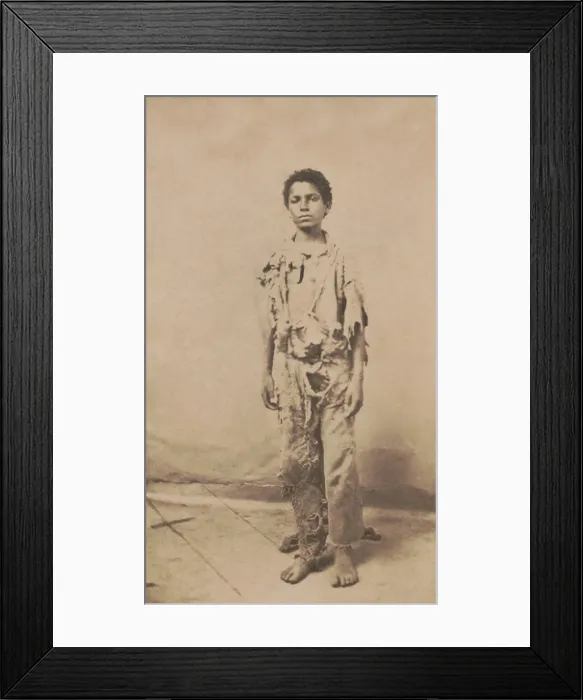 Framed Print : Young African American refugee, wearing rags from his place of enslavement in Louisiana. This photo was taken before he became a drummer boy