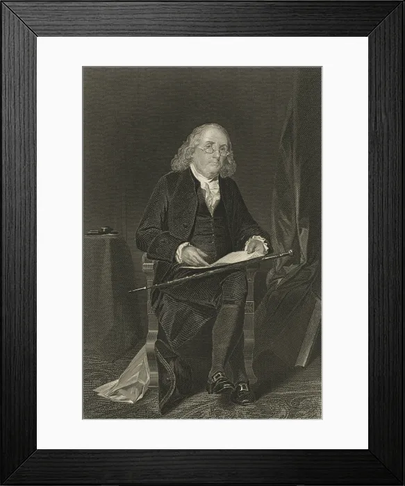 Framed Print : Benjamin Franklin, holds a document while seated in a chair. Full length portrait by Alonzo Chappel, 1863. (BSLOC_2019_4_102)