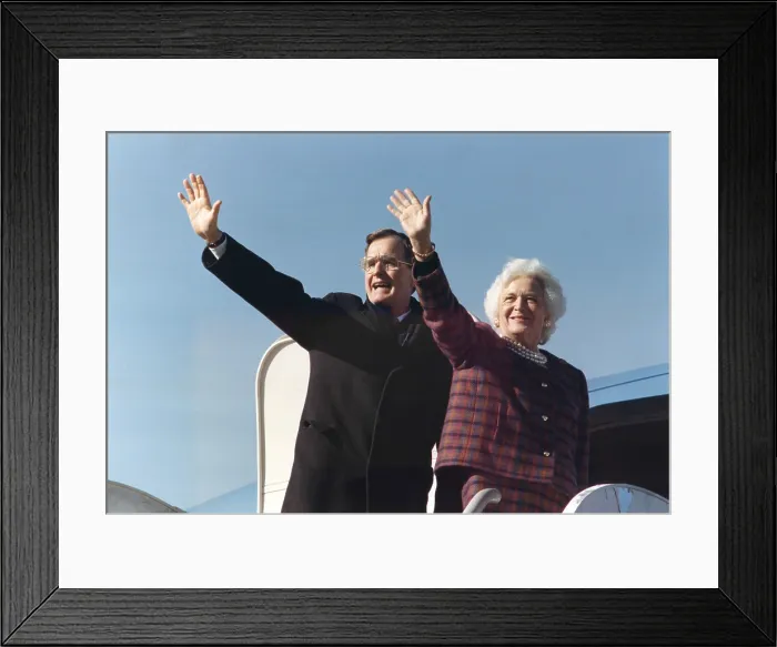 Framed Print : President George H.W. Bush and First Lady Barbara Bush, waving from the doorway of Air Force One, February 13, 1989 (BSLOC_2021_3_51)
