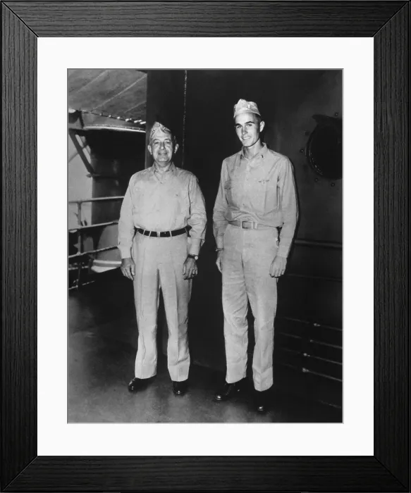 Framed Print : Ensign George H.W. Bush stands with Rear Admiral James Kauffmann ca. 1943. They were relatives by the marriage of Kauffmans daughters to Bushs brother, Prescott