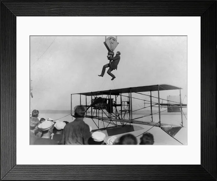 Framed Print : Hoisting Glenn Curtiss into his hydroplane on board the USS Pennsylvania at San Diego, CA, 1911 (BSLOC_2016_13_182.jpg )
