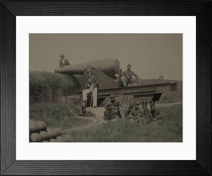 Framed Print : Lieutenant Samuel K. Thompson, Company C, 54th U.S. Colored Troops Infantry Regiment, posed with a 10 inch Rodman cannon
