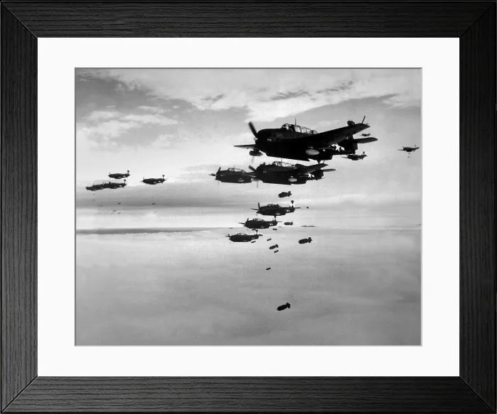 Framed Print : Planes from the USS Essex aircraft carrier dropping bombs on Hokadate, Japan, July 1945. World War 2, Pacific Ocean. (BSLOC_2013_13_7)