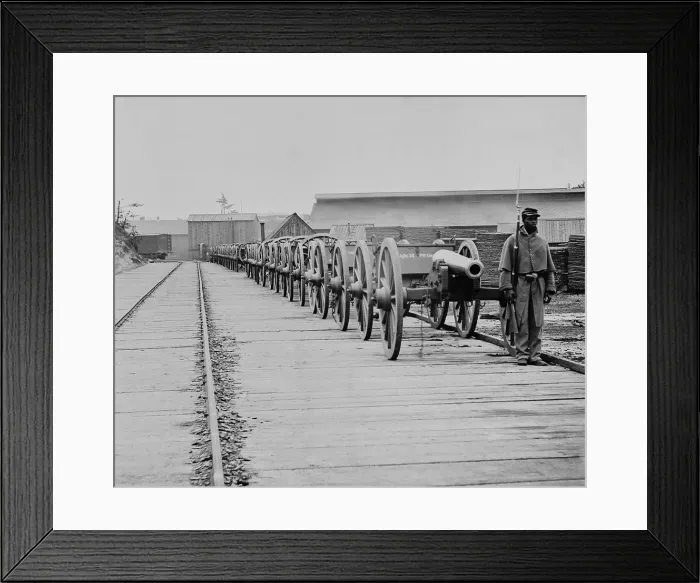 Framed Print : African American Union soldiers guarding 12-powder Napoleon cannons at City Point, Virginia, 1865. A railroad track runs alongside the cannons (BSLOC_2018_5_133) Framed Print : African American Union soldiers guarding 12-powder Napoleon cannons at City Point, Virginia, 1865. A railroad track runs alongside the cannons (BSLOC_2018_5_133)