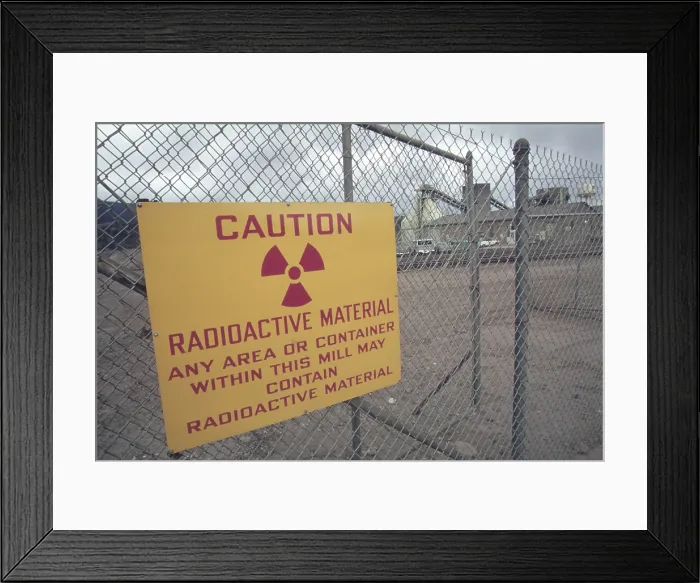 Framed Print : Radiation warning sign at a Union Carbide uranium mill near Rifle Colorado. Many former workers have ongoing health problems from working at the plant. Ca. 1973-75 Framed Print : Radiation warning sign at a Union Carbide uranium mill near Rifle Colorado. Many former workers have ongoing health problems from working at the plant. Ca. 1973-75