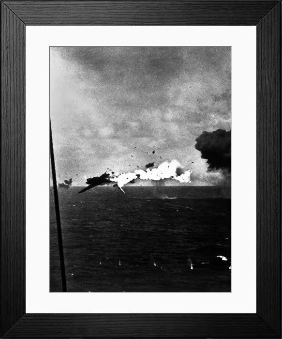 Framed Print : Japanese bomber explodes after direct hit by 5 inch shell from USS Yorktown, Dec. 4, 1943. Off Kwajalein Atoll. World War 2, Pacific Ocean. (BSLOC_2013_13_9)