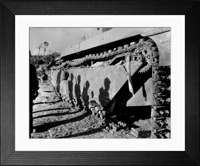 Framed Print : Shadows of 6th Division Marines on a battle-wrecked tank on Okinawa. The soldiers are advancing to mop up operations in the southern tip of the island Framed Print : Shadows of 6th Division Marines on a battle-wrecked tank on Okinawa. The soldiers are advancing to mop up operations in the southern tip of the island