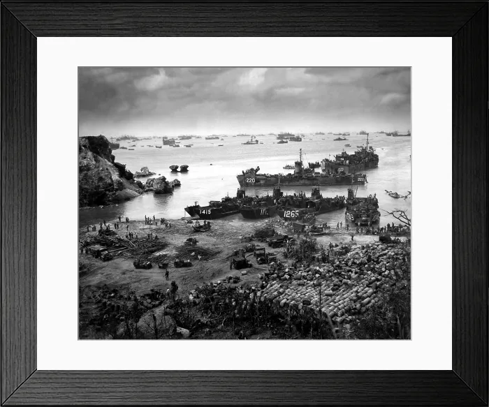 Framed Print : Landing craft of supply U.S. forces on Okinawa, 13 days after the initial invasion. Beyond are U.S. battlewagons, cruisers and destroyers. April 13, 1945. World War 2 Framed Print : Landing craft of supply U.S. forces on Okinawa, 13 days after the initial invasion. Beyond are U.S. battlewagons, cruisers and destroyers. April 13, 1945. World War 2