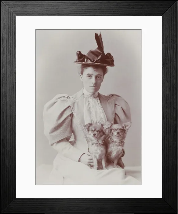 Framed Print : Edith Wharton was photographed by E. F. Cooper, at Newport, Rhode Island, 1889-1890. Edith has two small dogs wearing necklaces on her lap