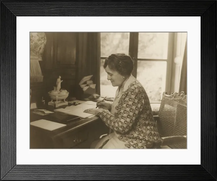 Framed Print : Edith Wharton, writes at her desk in 1920 Framed Print : Edith Wharton, writes at her desk in 1920