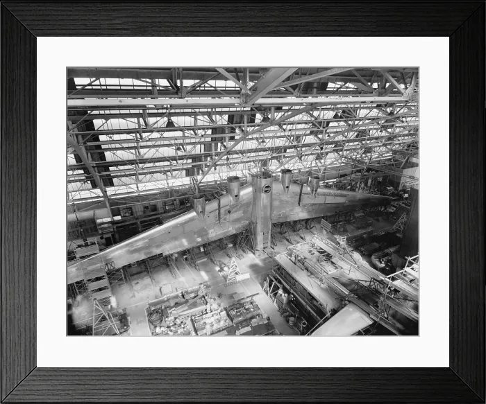Framed Print : Massive wing of a B-19 Bomber under construction in a during World War 2 in 1941. (BSLOC_2013_14_115) Framed Print : Massive wing of a B-19 Bomber under construction in a during World War 2 in 1941. (BSLOC_2013_14_115)