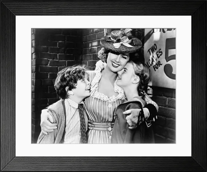Framed Print : A TREE GROWS IN BROOKLYN, from left, Ted Donaldson, Joan Blondell, Peggy Ann Garner, 1945, TM and Copyright 20th Century Fox Film Corp. All rights reserved