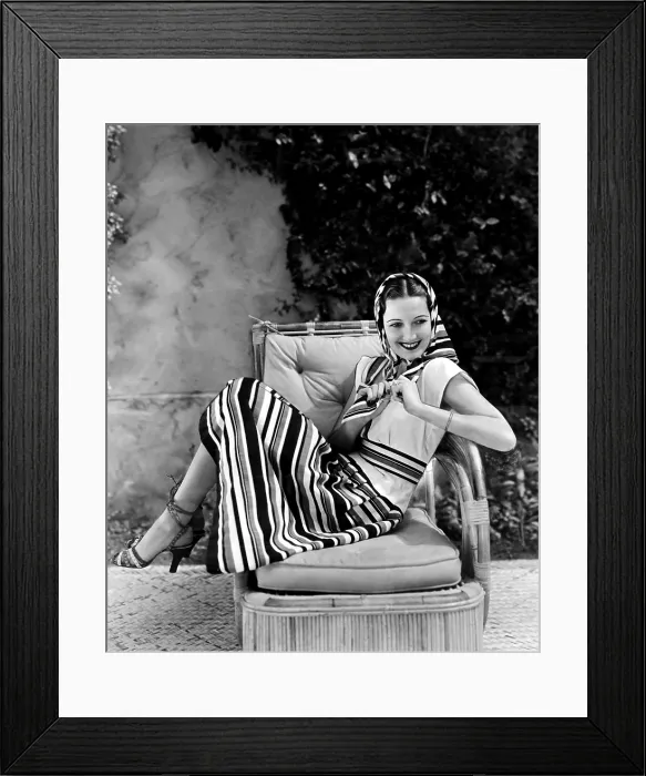 Framed Print : TROPIC HOLIDAY, Dorothy Lamour, in a striped linen dress of white, black and red by Edith Head, 1938