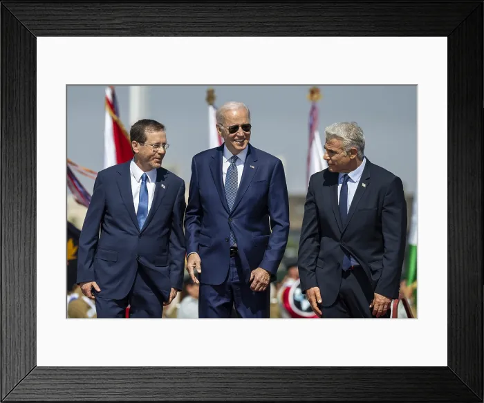 Framed Print : President Joe Biden, is flanked by Israeli President Isaac Herzog (right), during the arrival ceremony, at Ben Gurion Airport in Tel Aviv, Israel, July 13, 2022. (BSLOC_2022_6_25)