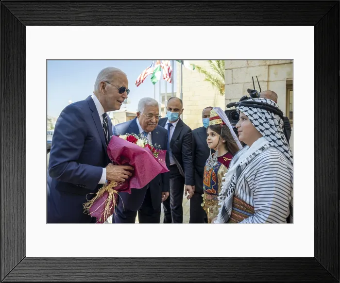 Framed Print : Two Palestinian children in traditional costumes give flowers to President Biden during the arrival ceremony at the Presidential Palace in Bethlehem, July 15, 2022 Framed Print : Two Palestinian children in traditional costumes give flowers to President Biden during the arrival ceremony at the Presidential Palace in Bethlehem, July 15, 2022