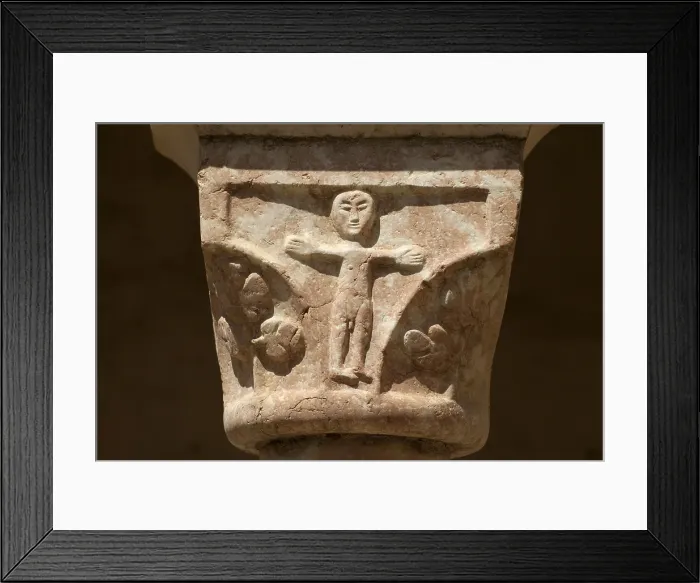 Framed Print : FRANCE. Saint Genis-des-Fontaines. Saint Genis Abbey. Monastery founded in 10th century. Cloister from 13th century. Detail of a decorated capital. Romanesque art. Relief on rock