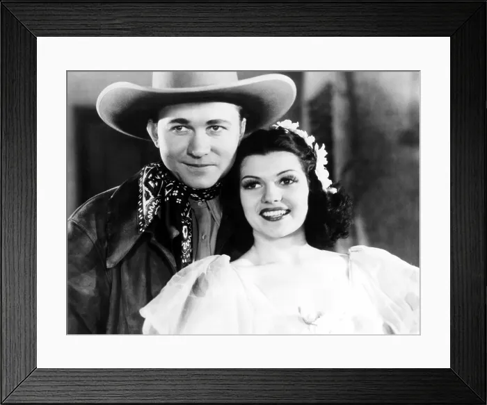 Framed Print : TROUBLE IN TEXAS, from left: Tex Ritter, Rita Hayworth as Rita Cansino, 1937 Framed Print : TROUBLE IN TEXAS, from left: Tex Ritter, Rita Hayworth as Rita Cansino, 1937