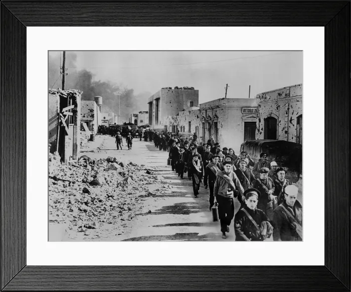 Framed Print : Italian naval prisoners march through Tobruk on their way to a prison camp in 1941. World War 2 in North Africa. (BSLOC_2013_14_13)