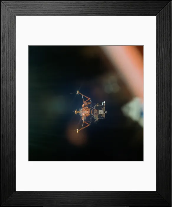 Framed Print : The Apollo 11 Lunar Module. The LM has separated from the Command Module and beginning it's descent to the Moon's surface. July 20, 1969 Framed Print : The Apollo 11 Lunar Module. The LM has separated from the Command Module and beginning it's descent to the Moon's surface. July 20, 1969