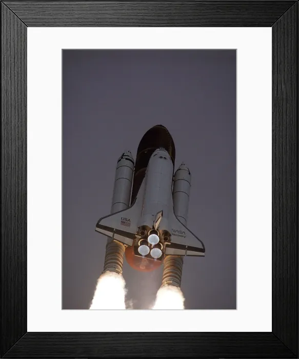 Framed Print : Space Shuttle Discovery launched with Hubble Space Telescope in its cargo bay. April 24, 1990