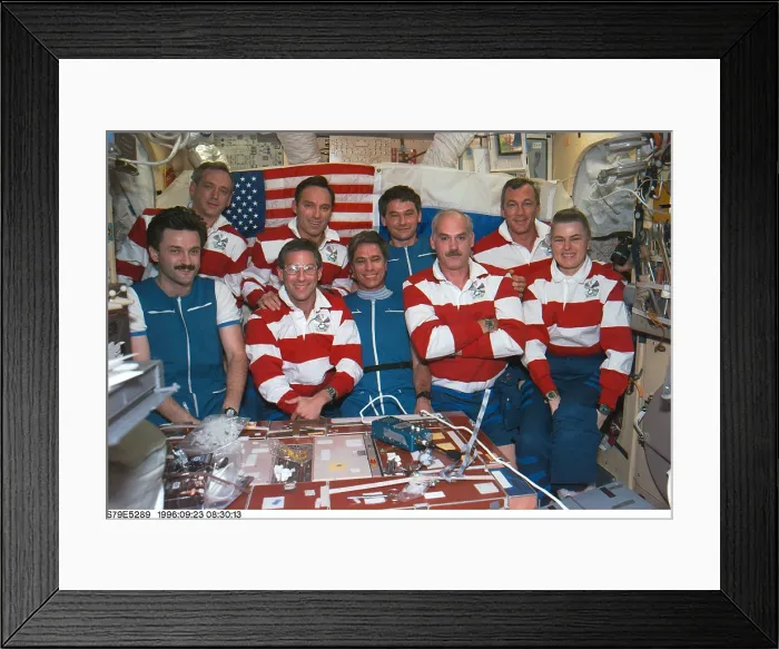Framed Print : Astronauts and Cosmonauts aboard Russia's Mir Space Station. Russians are wearing blue, and Americans wearing red stripes