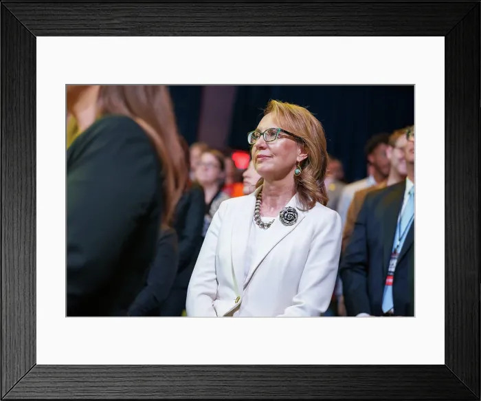 Framed Print : Former Congresswoman, Gabby Giffords, attends President Joe Biden speech at the National Safer Communities Summit, June 16, 2023, in Hartford, Connecticut