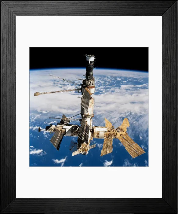 Framed Print : Russian Space Station Mir. Photo was taken by the crew of space shuttle Atlantis after undocking from the station. Oct. 20, 1997. At top is a docked Soyuz spacecraft. Oct Framed Print : Russian Space Station Mir. Photo was taken by the crew of space shuttle Atlantis after undocking from the station. Oct. 20, 1997. At top is a docked Soyuz spacecraft. Oct