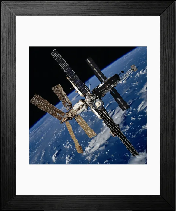 Framed Print : Russian Space Station Mir. Photo was taken by the crew of space shuttle Atlantis after undocking from the station. Oct. 20, 1997