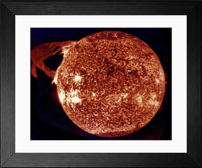 Framed Print : Ultraviolet exposure of colossal eruption on the Sun. This solar prominence, one of the largest in 25 years, erupted over 300, 000 miles into space