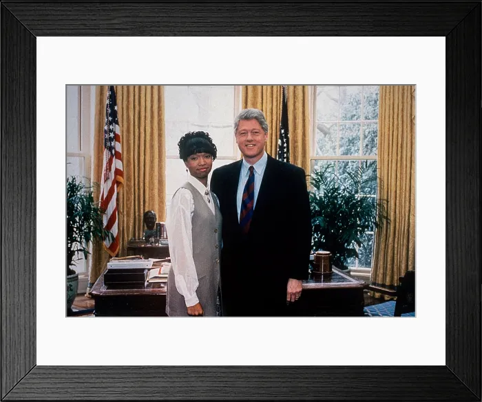 Framed Print : President Bill Clinton poses with PSA Costar, Alicia Brown, 1994. (BSLOC_2021_7_21) Framed Print : President Bill Clinton poses with PSA Costar, Alicia Brown, 1994. (BSLOC_2021_7_21)