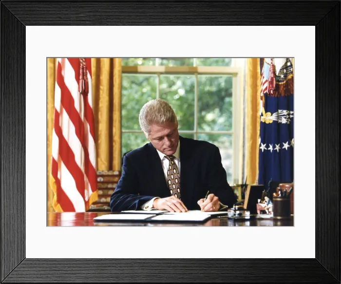 Framed Print : Bill Clinton signing a bill which included a line-item veto on Aug. 11, 1997. Congress had empowered this action with the Line Item Veto Act of 1996