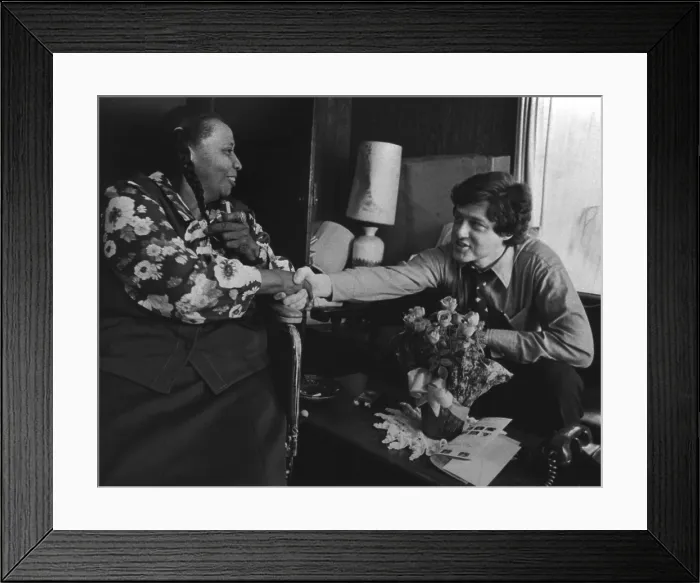 Framed Print : Bill Clinton campaigning in the Arkansas home of an African American women in 1977. Clinton was then Arkansas Attorney General, and preparing to run for governor in 1978