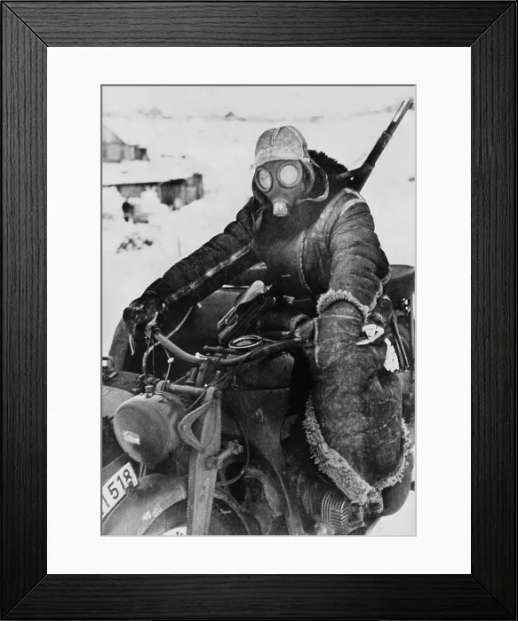 Framed Print : German motorcycle on the Soviet (Russian) Eastern front in the winter of 1942. He wears his gas mask to protect his face from the bitter cold, during World War 2