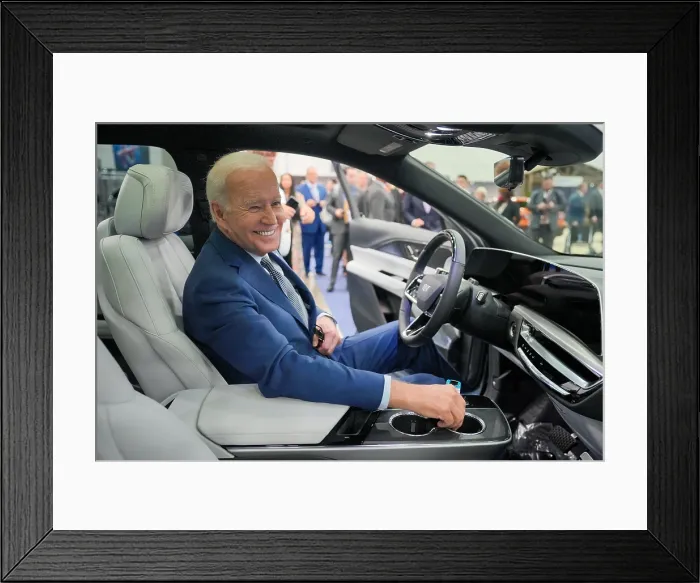 Framed Print : President Joe Biden checks out the Cadillac Lyriq at the North American International Auto Show, Sept. 14, 2022. The SUV is Cadillacs first all-electric vehicle Framed Print : President Joe Biden checks out the Cadillac Lyriq at the North American International Auto Show, Sept. 14, 2022. The SUV is Cadillacs first all-electric vehicle