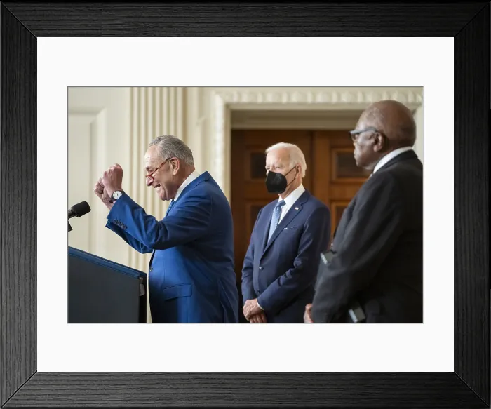 Framed Print : Senate Majority Leader Chuck Schumer (D-N.Y.) gestures enthusiastically gestures as he delivers remarks at the signing of Inflation Reduction Act of 2022, at the White House, Aug