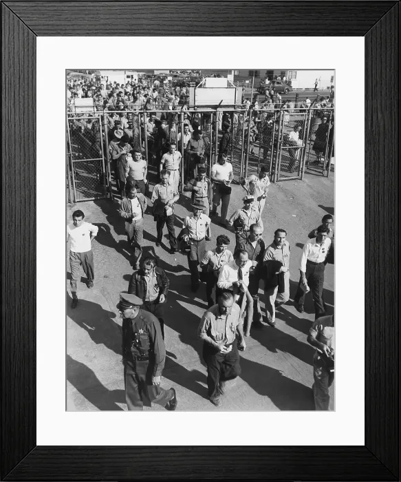 Framed Print : North American Aviation employees go to work in Inglewood, California, during World War 2. Employees must display their badges and identification cards before admittance. Ca Framed Print : North American Aviation employees go to work in Inglewood, California, during World War 2. Employees must display their badges and identification cards before admittance. Ca