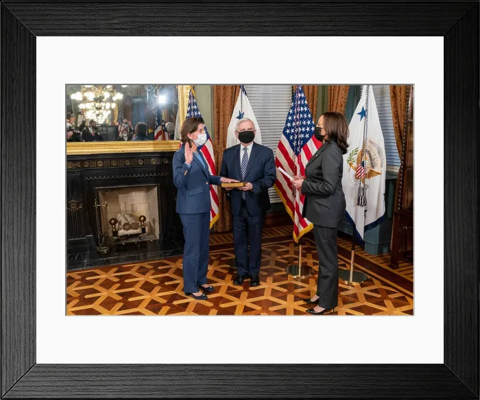 Framed Print : Gina Raimondo is sworn in as Secretary of Commerce by Vice President Kamala Harris, March 3, 2021. Raimondo was elected governor of Rhode Island in 2014 and 2018 Framed Print : Gina Raimondo is sworn in as Secretary of Commerce by Vice President Kamala Harris, March 3, 2021. Raimondo was elected governor of Rhode Island in 2014 and 2018
