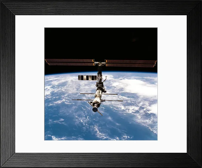 Framed Print : International Space Station in 2001. Photo made from the Space Shuttle Discovery after joint mission and an crew exchange. March 18, 2001 Framed Print : International Space Station in 2001. Photo made from the Space Shuttle Discovery after joint mission and an crew exchange. March 18, 2001