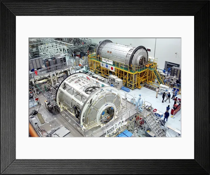 Framed Print : Japan's contribution to the International Space Station. In upper right is the Japanese Experiment Module under preparation for Shuttle transport into space