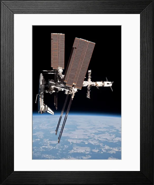 Framed Print : Space Shuttle Endeavor docked to the International Space Station. Photo taken from a departing Soyuz spacecraft, whose crew completed a 159 day space mission. May 23, 2011 Framed Print : Space Shuttle Endeavor docked to the International Space Station. Photo taken from a departing Soyuz spacecraft, whose crew completed a 159 day space mission. May 23, 2011