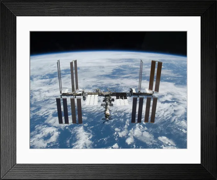 Framed Print : International Space Station in 2009. Photo made by a departing space shuttle Atlantis on Nov. 25, 2009 Framed Print : International Space Station in 2009. Photo made by a departing space shuttle Atlantis on Nov. 25, 2009