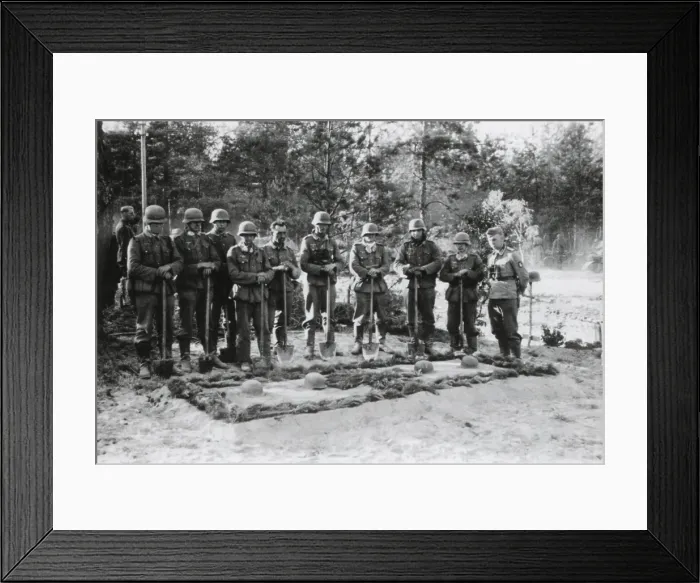 Framed Print : Reverent German soldiers stand with shovels at the grave of the commanding officer