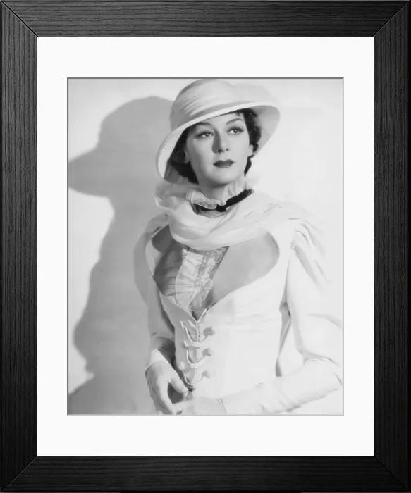 Framed Print : UNDER TWO FLAFS, Rosalind Russell, 1936, TM & Copyright 20th Century Fox Film Corp. / courtesy Everett Collection Framed Print : UNDER TWO FLAFS, Rosalind Russell, 1936, TM & Copyright 20th Century Fox Film Corp. / courtesy Everett Collection