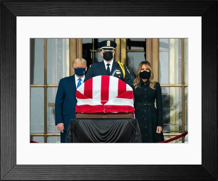 Framed Print : President Donald Trump and First Lady Melania Trump stand in respect by the flag-draped coffin of Supreme Court Justice Ruth Bader Ginsburg, Sept. 24, 2020